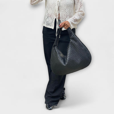 Cristina – Bolso de mano trenzado y moderno