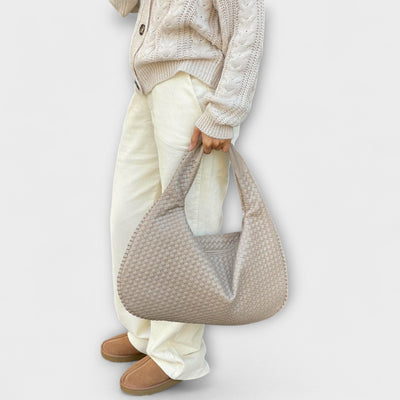 Cristina – Bolso de mano trenzado y moderno