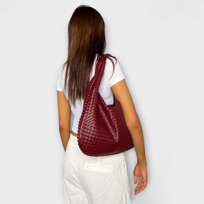 Cristina – Bolso de mano trenzado y moderno