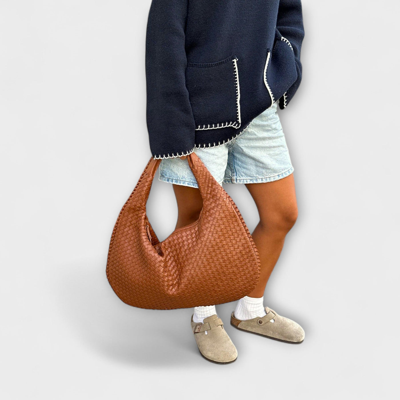 Cristina – Bolso de mano trenzado y moderno